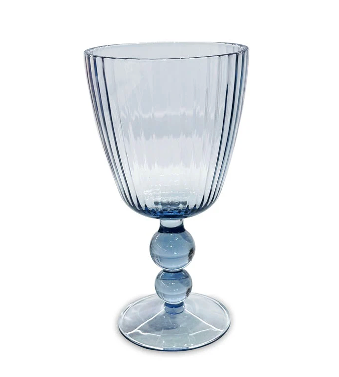 The Beatriz Ball Vida Acrylic Drinkware Set of 4 in Blue features blue-tinted goblets with vertical ribbed bowls and stems with two stacked spheres above wide bases—perfect for all-purpose use or as a chic set.
