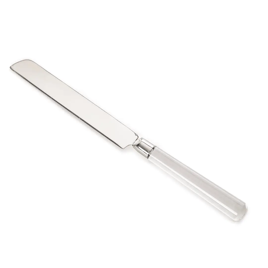 The Coco Clear Acrylic Bread Knife by Inspired Generations, featuring a serrated blade and a transparent acrylic handle, is shown on a white background.