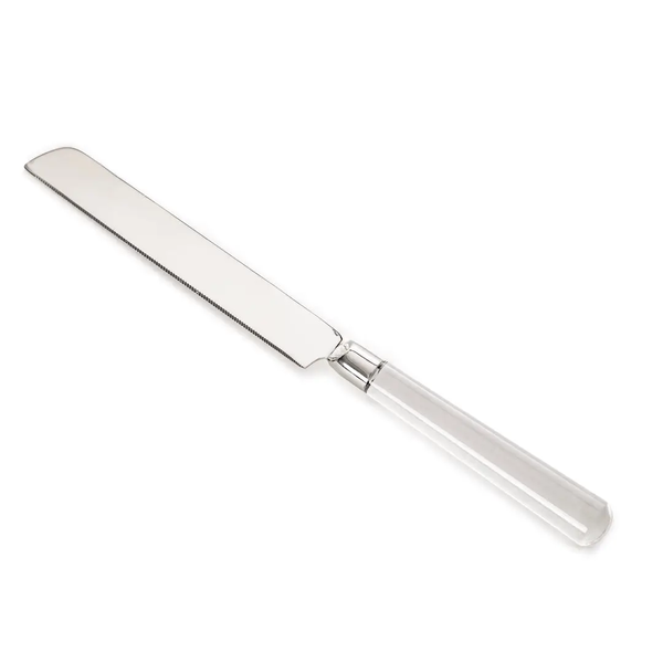 The Coco Clear Acrylic Bread Knife by Inspired Generations, featuring a serrated blade and a transparent acrylic handle, is shown on a white background.