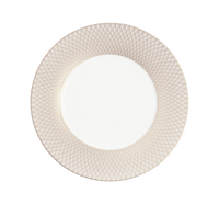 A round white plate from the Christofle Malmaison Imperiale Porcelain Dinnerware Platinum collection is displayed from a top-down view against a plain white background, featuring a textured light beige rim with a repeating diamond pattern—an elegant and refined piece of dinnerware.