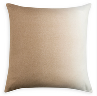 The Johanna Howard Dip Dye Pillow Camel is a square throw pillow with an elegant ombré gradient that transitions from beige to light cream against a white background.