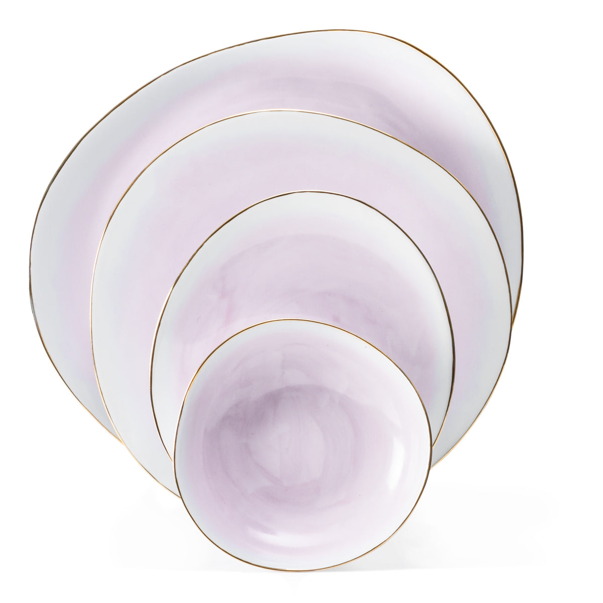 The Galette Dinnerware set by Molecot includes four pastel lavender plates and bowls with irregular round shapes, hand-painted porcelain, subtle gold rims, and a glossy finish—each piece stacks neatly inside the next.
