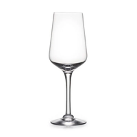 A clear, empty wine glass from Simon Pearce’s Vintner Stemware collection, featuring a classic pulled-stem design with a long stem and wide base, is displayed against a white background.