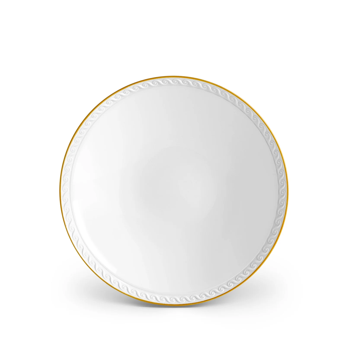 The Neptune Gold plate by L’Objet is a round white porcelain piece featuring a subtle swirl near the rim and a 24k gold edge, shown on a plain white background.