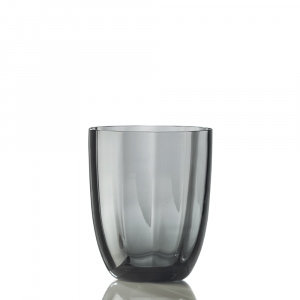 The Idra Tumbler Optic by Nason Moretti is a transparent, double-walled glass cup with a subtle gray tint, shown on a white background with a gentle surface reflection.
