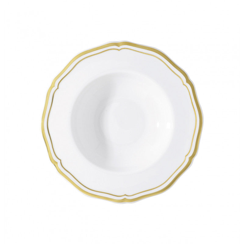 The Polka Gold Dinnerware by Raynaud features a white porcelain plate with a scalloped edge and gold trim, photographed from above against a plain white background.