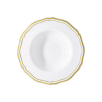 The Polka Gold Dinnerware by Raynaud features a white porcelain plate with a scalloped edge and gold trim, photographed from above against a plain white background.