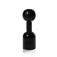 The Kym Black Candle Holders by Zodax feature a modern design with a round top, cylindrical neck, and wide cylindrical base in black marble, resembling geometric vases and displayed upright against a white background.