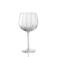 The Tolomeo Red Wine Glass by Nason Moretti features elegant blown glass with a long stem and round bowl, standing upright on a white background.