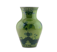 The Ginori 1735 Oriente Italiano Ming Vase 9" features a glossy green ceramic finish with dark green floral and geometric patterns—its wide body and narrow neck make it a stunning Italian decor accent for any room.
