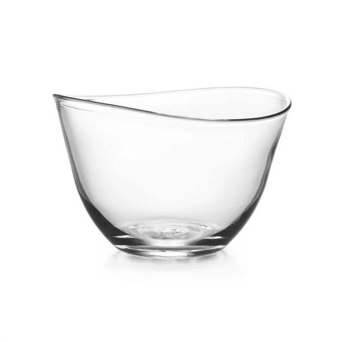The Simon Pearce Barre Bowl is a clear, slightly asymmetrical handmade glass bowl featuring a smooth, curved rim and rounded base, showcased against a plain white background.