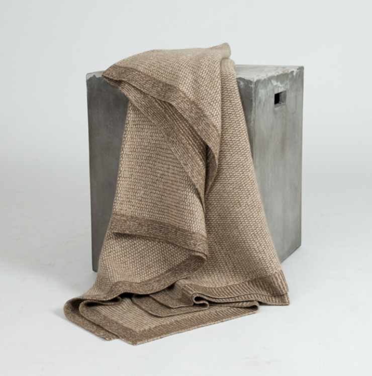 Hangai Mountain Textiles Beehive Cashmere & Yak Throw - Beige & Cappuccino knit blanket draped over a gray block.