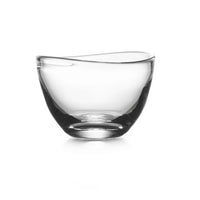 The Simon Pearce Barre Bowl is a clear, shallow, curved glass bowl displayed on a white background, showcasing contemporary design and the timeless elegance of Simon Pearce glassware.