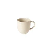 A plain, off-white ceramic mug with a rounded shape, handle, and subtle speckles evokes the timeless charm of Costa Nova's Pacifica Vanilla Dinnerware against a white background.