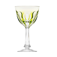The Lady Hamilton White Wine Glass by Moser features clear crystal with a tall stem, wide bowl, light green accents, and intricate cut patterns.