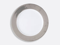 The Bernardaud Athena Platinum Dinnerware features a white porcelain plate with a wide metallic silver rim and a geometric square pattern, shown against a plain light background.