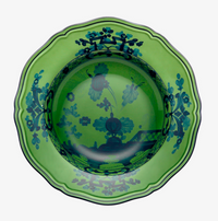 The Oriente Italiano Dinnerware Malachite bowl by Ginori 1735 features a green hue with scalloped edges and dark blue floral and geometric patterns—an elegant piece of Italian ceramic tableware.