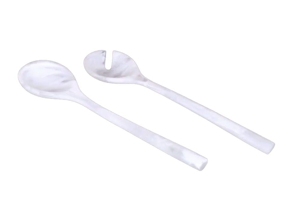 A solid white salad spoon and a slotted salad fork from the Dawn Resin Swirl Salad Servers - White set, both featuring a marbled pattern.