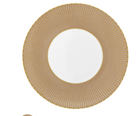 A round porcelain plate from Raynaud's Tresor Dinnerware Beige collection, featuring a white center and a wide, textured beige and gold patterned rim, is displayed from above against a white background. This elegant 8 3/4 inch plate makes a timeless addition to any porcelain dinnerware collection.