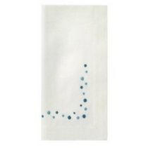 Add charm to your table with Bodrum’s Dots Napkin Set of 4- Blue—white cloth napkins featuring a curved pattern of small blue dots near one corner, perfect for enhancing any white napkin set.