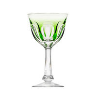 The Lady Hamilton White Wine Glass by Moser features a faceted bowl with light green accents near the rim, set on a slender stem and round base—an elegant crystal glass shown against a white background.