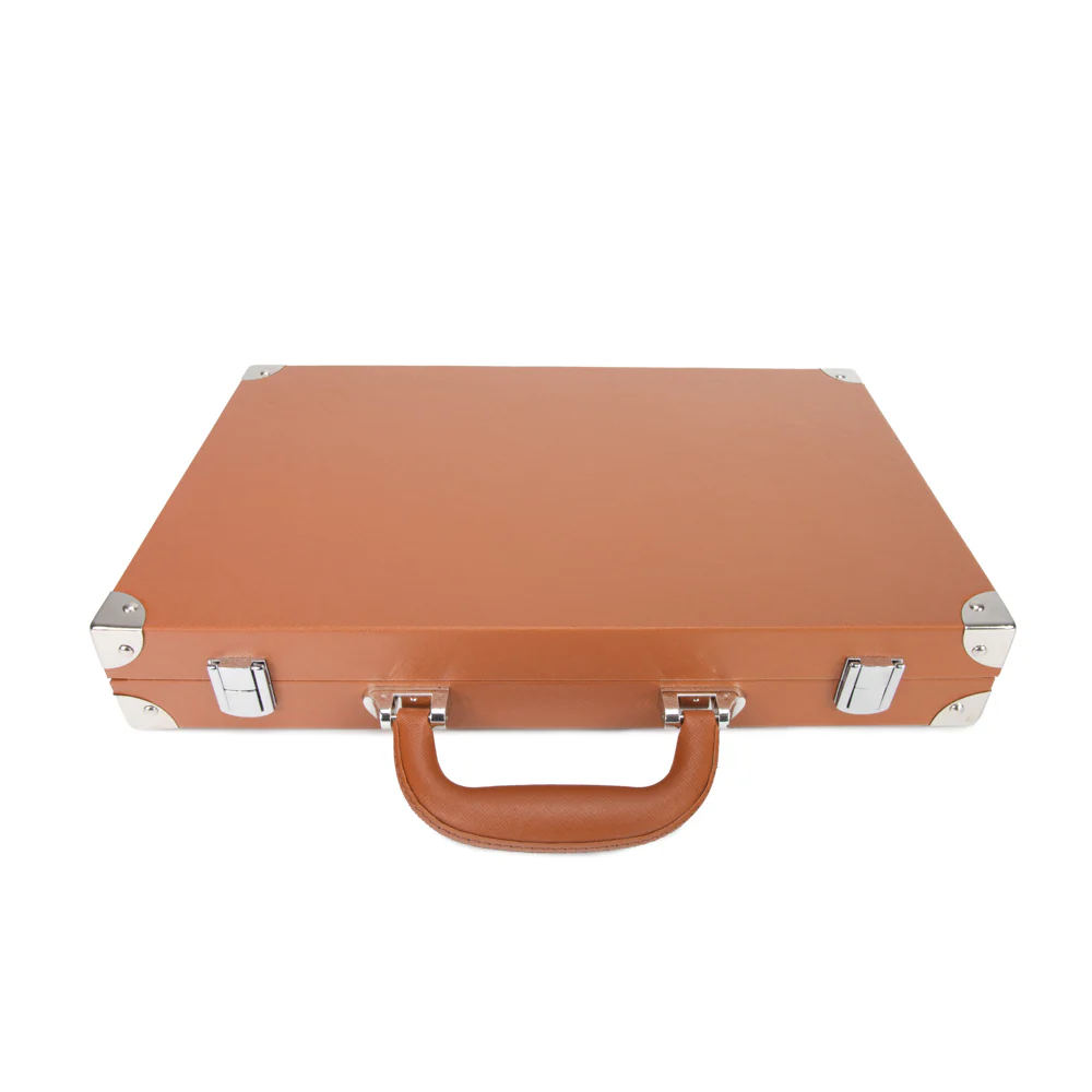 The Brouk & Co Excelsior Backgammon Set comes in a vintage-style brown vegan leather briefcase with silver hardware and a leather handle, perfect for carrying to game night. Shown isolated on a white background.