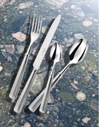 The Beatrix Flatware 5 Piece Setting by Alain Saint-Joanis features elegant, ribbed stainless steel utensils with a shiny finish. Includes a fork, knife, soup spoon, teaspoon, and salad fork. Dishwasher safe for easy cleaning.