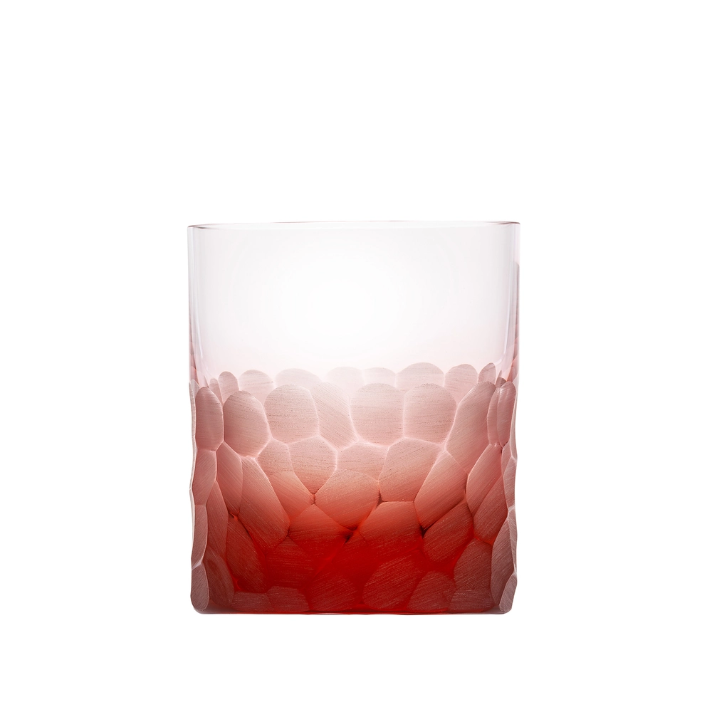 The Moser Pebbles DOF 370 ml is a clear whisky glass tumbler crafted from lead-free Czech crystal, featuring a hammered texture and a gradient red color that transitions from deep red at the base to clear at the top.