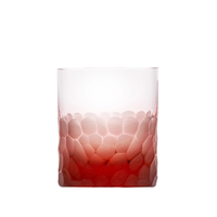 The Moser Pebbles DOF 370 ml is a clear whisky glass tumbler crafted from lead-free Czech crystal, featuring a hammered texture and a gradient red color that transitions from deep red at the base to clear at the top.