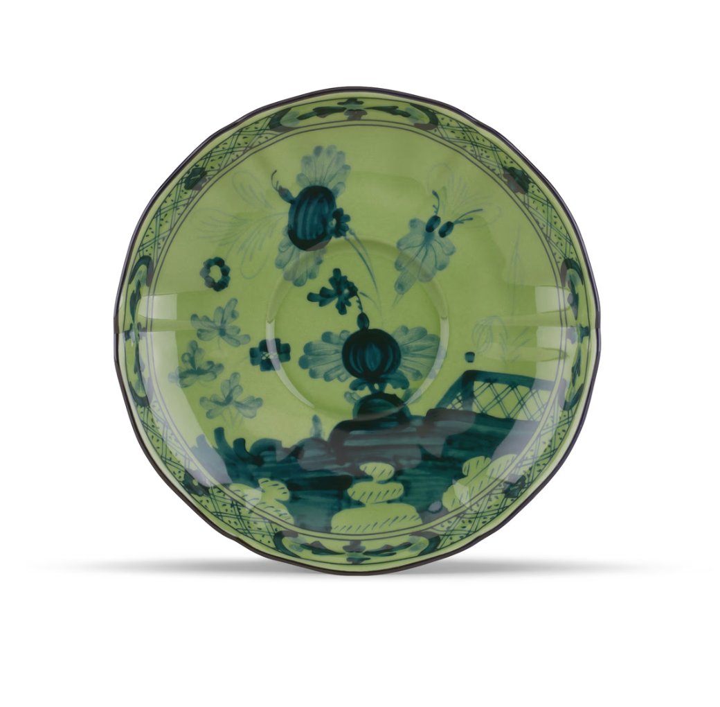 Pale green Ginori 1735 Oriente Italiano Dinnerware Malachite saucer featuring a dark blue floral and garden motif.
