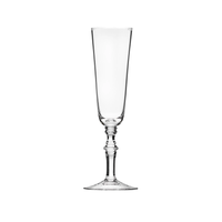 The Moser Mozart champagne flute features a clear, slender stem and round base, showcased against a plain white background.