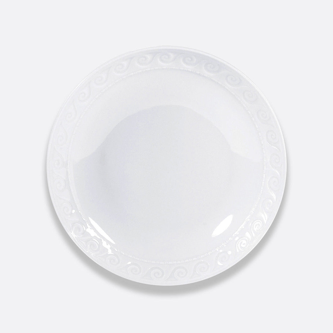 The Bernardaud Louvre Dinnerware features a white, round ceramic plate with a subtle swirl pattern along the rim, shown from above on a light gray background.