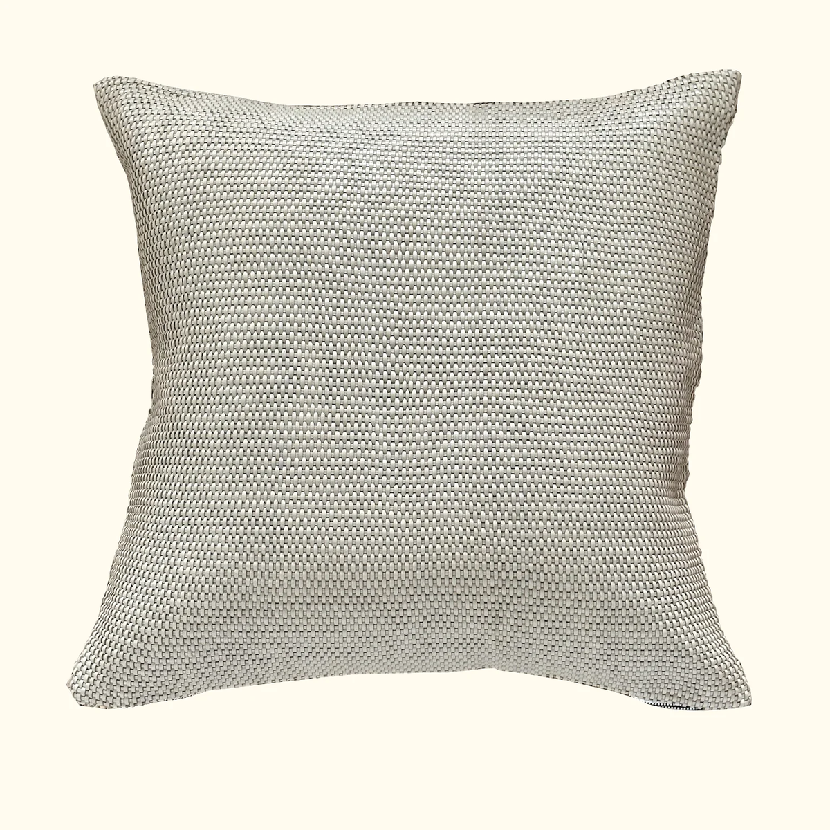 The Leather Weave Pillow Ivory by Threads Soft Goods is a square, textured throw pillow with woven ivory leather, shown against a plain beige background.