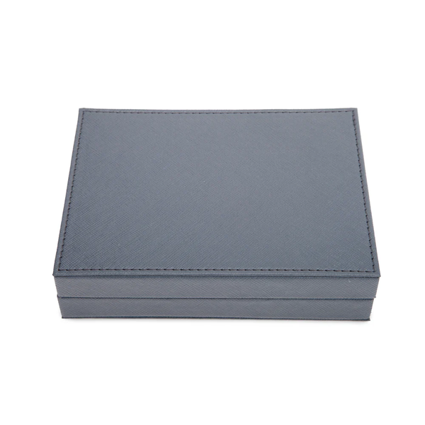 The Rowan Poker Card Set by Brouk & Co features a closed, rectangular gray vegan leather case with textured surface and visible stitching, shown against a plain white background.