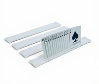 A Luxe Dominoes Luxe Canasta & More Card Racks Set of 4 displays a complete spade suit arranged from ace to king, with three empty white card holders placed behind it on a white surface.