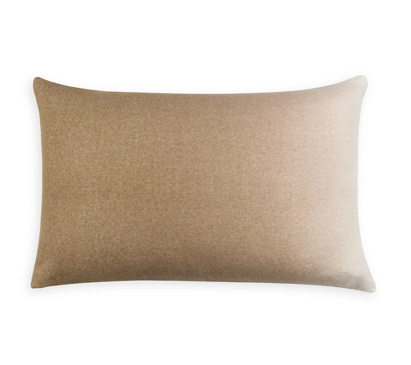 The Johanna Howard Dip Dye Pillow Camel is a rectangular, light brown baby alpaca pillow with a smooth fabric cover, displayed against a plain white background.