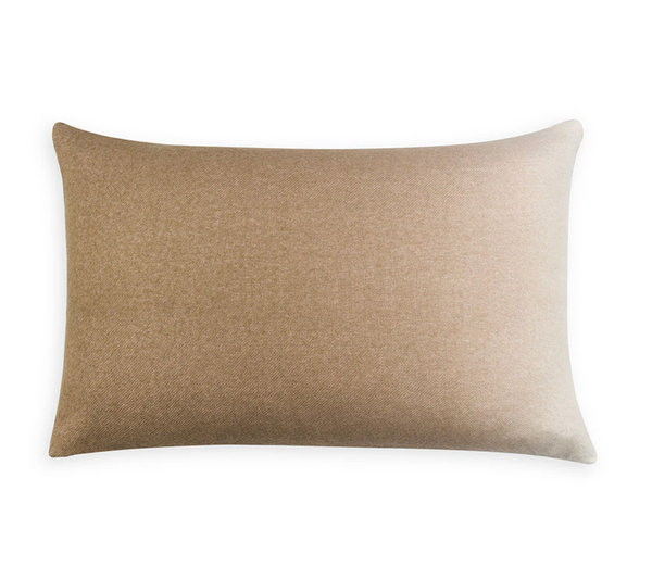 The Johanna Howard Dip Dye Pillow Camel is a rectangular, light brown baby alpaca pillow with a smooth fabric cover, displayed against a plain white background.