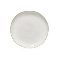 The Brisa Branca Dinnerware by Casafina/Costa Nova is a handcrafted, round, off-white stoneware plate with slightly irregular edges, made in Portugal and shown on a white background.