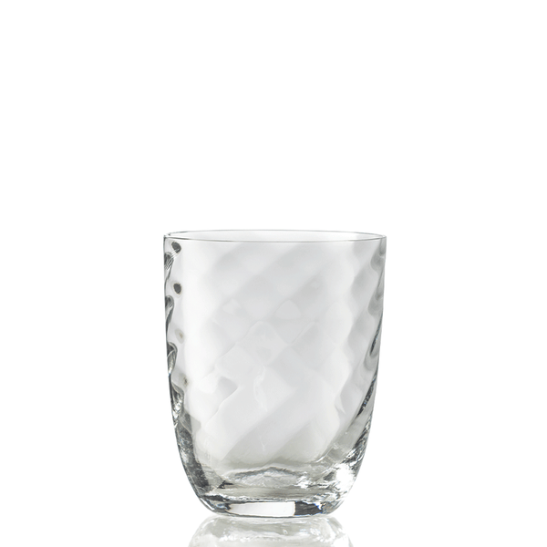 The Idra Tumbler Optic Twist by Nason Moretti is a clear glass with a textured, diamond-patterned surface, shown against a white background.