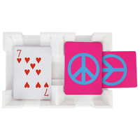 The Canasta Spinner by Canasta Sets features a white tray with three cards—one shows the seven of hearts, two display pink backs with bold blue peace symbols—a unique accessory perfect for your next canasta game night.