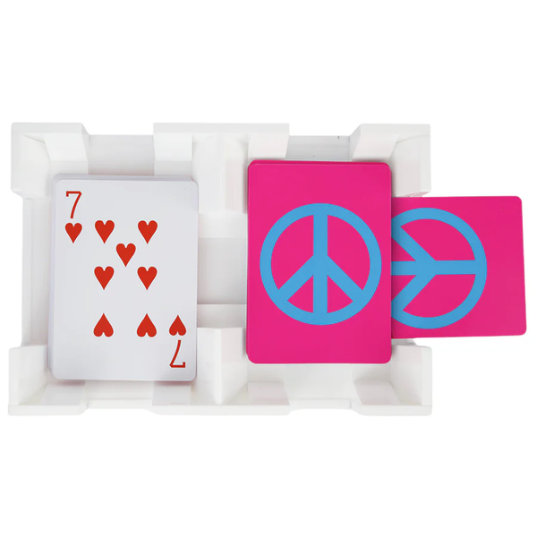 The Canasta Spinner by Canasta Sets features a white tray with three cards—one shows the seven of hearts, two display pink backs with bold blue peace symbols—a unique accessory perfect for your next canasta game night.