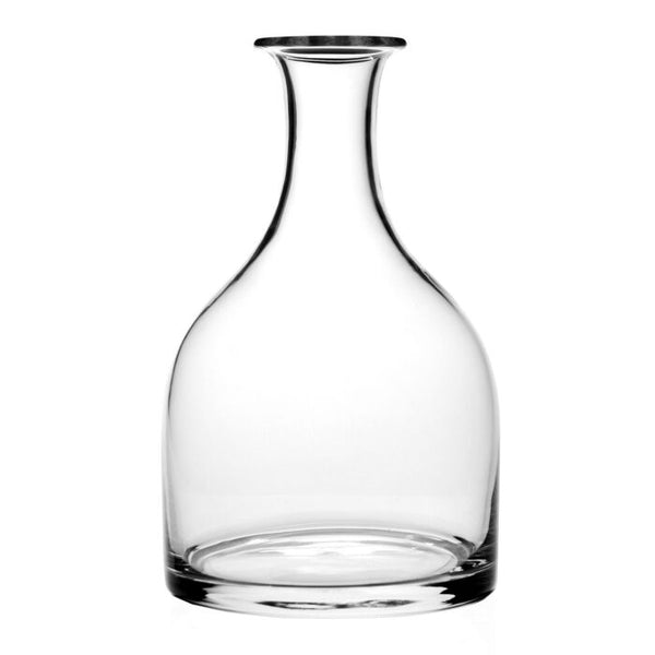 The William Yeoward Classic Carafe Magnum is a clear glass decanter with a wide base, narrow neck, and flared rim—perfect as a wine carafe or magnum decanter for elegant table settings.