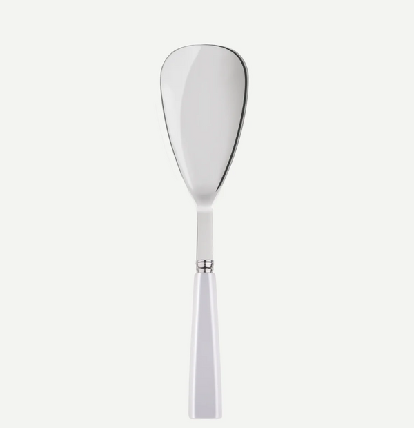 The Sabre Icone Rice Spoon White by Sabre features a wide, flat, slightly curved stainless steel blade and a white handle, shown against a plain white background.