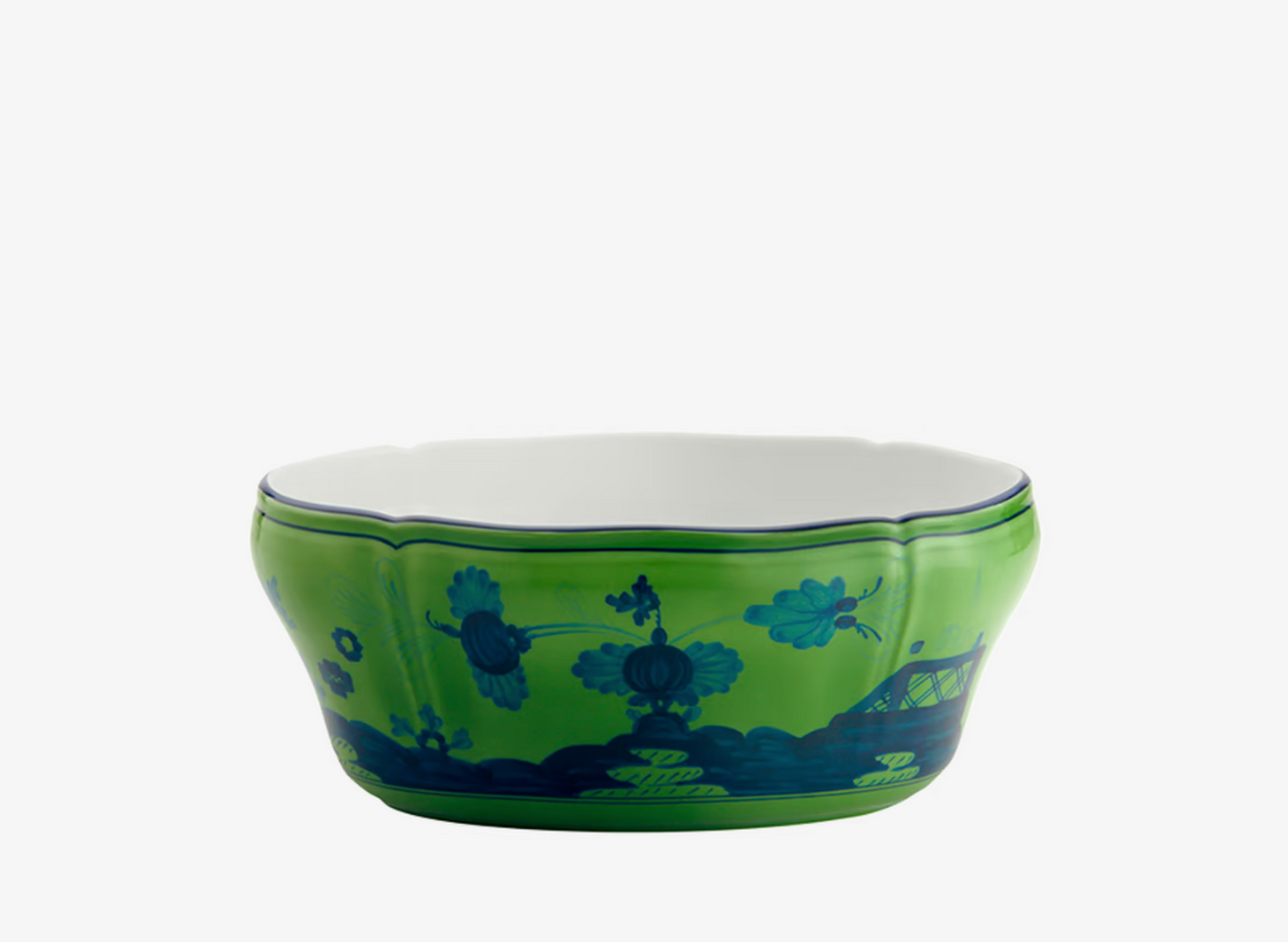The Oriente Italiano Dinnerware Malachite bowl by Ginori 1735 has a scalloped edge, glossy green exterior with dark blue floral and landscape patterns, a smooth white interior, and is shown against a white background.