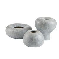 The Dandy Vases s/3 - Grey by Arteriors showcases three modern, round ceramic vases in assorted shapes and heights, each finished in a soothing light gray “icy morn” hue that brings spa-like serenity to any space, displayed against a white background.