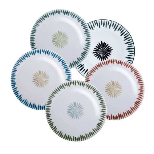 Four white ceramic plates with platinum rims, from Marie Daâge's Allee de Cypres 4 Platinum Rim collection, showcase the artistry of hand painted Limoges dinnerware and the elegance of luxury French tableware.