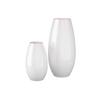 The Arteriors Yancy Vases Set of 2 – NEW ADDITION features glossy white porcelain vases of varying heights with smooth, rounded shapes and narrow openings, arranged side by side for a minimalist display.