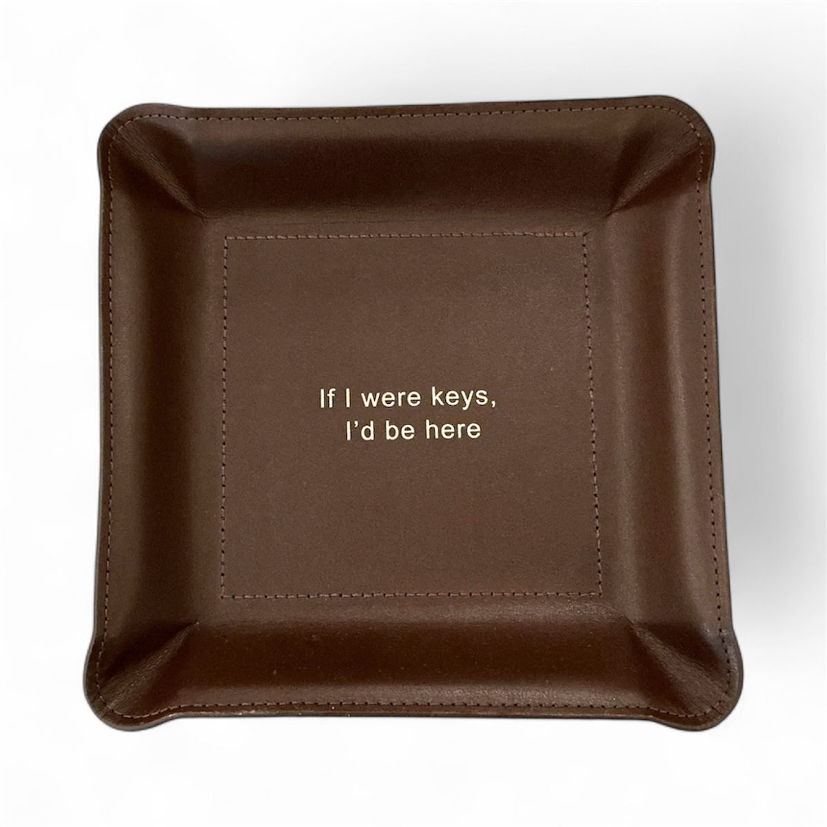 The Graphic Image Leather Valet Tray - If I Were Keys... features brown leather with "If I were keys, I'd be here" in white text—an ideal travel organizer for your essentials.