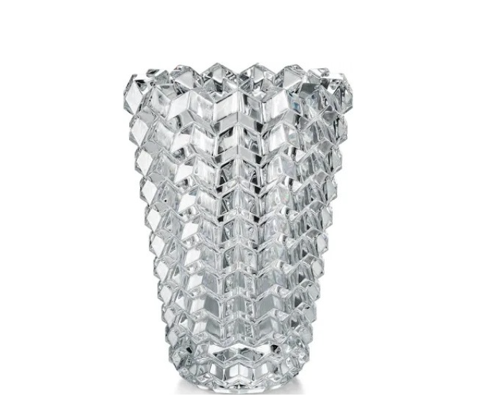 The Baccarat Zig Zag Vase features a clear crystal body with a faceted geometric surface resembling interlocking hexagons, inspired by contemporary sculpture, shown against a plain white background.