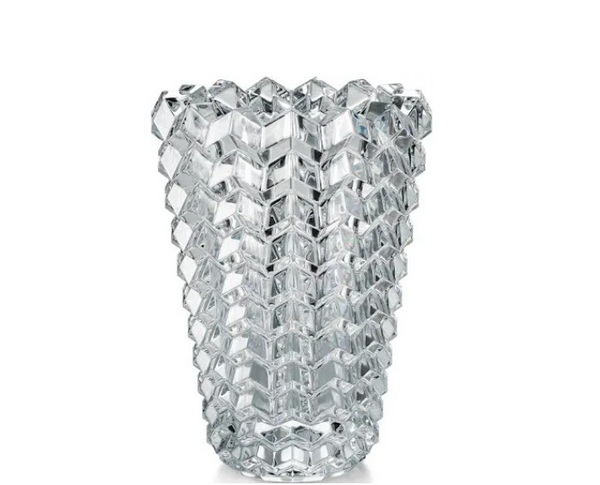 The Baccarat Zig Zag Vase features a clear crystal body with a faceted geometric surface resembling interlocking hexagons, inspired by contemporary sculpture, shown against a plain white background.